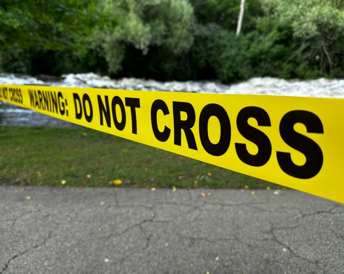 Yellow caution tape with "do not cross" text