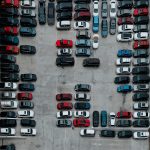 aerial photography of cars on parking lot