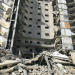 a very large building that is being demolished