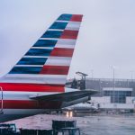 a large jetliner sitting on top of an airport tarmac