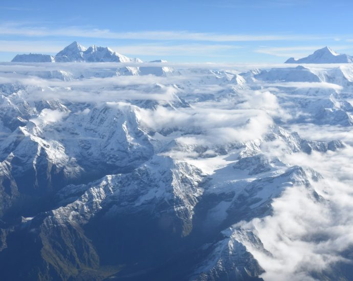 white fog on mountain during daytime