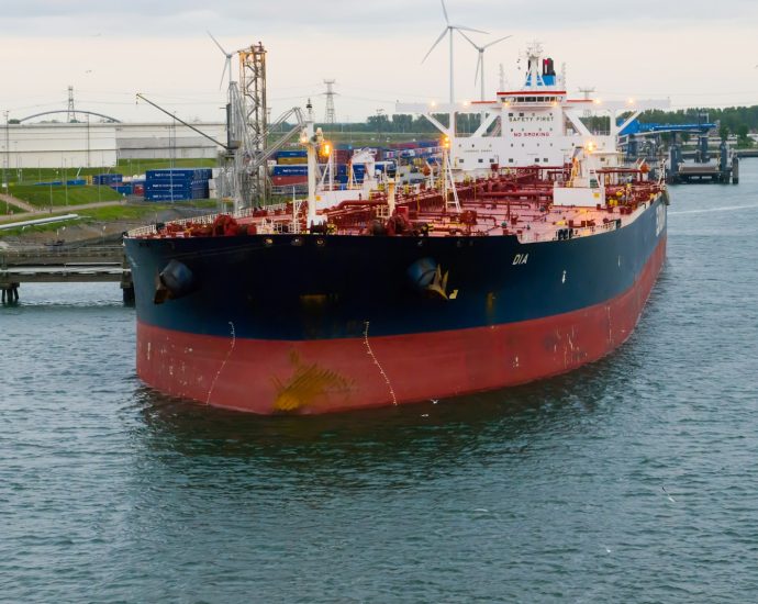 a large boat floating on top of a body of water