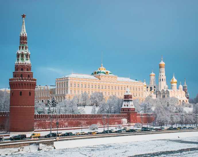 Moscow's kremlin stands tall on a snowy winter day.