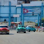 cars parked on street near building during daytime