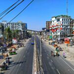 a busy city street with lots of traffic