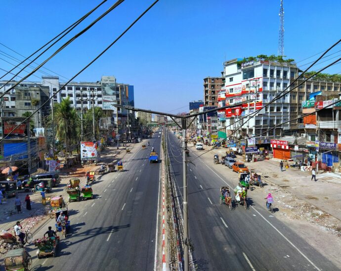 a busy city street with lots of traffic