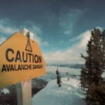 caution avalanche danger signage during winter
