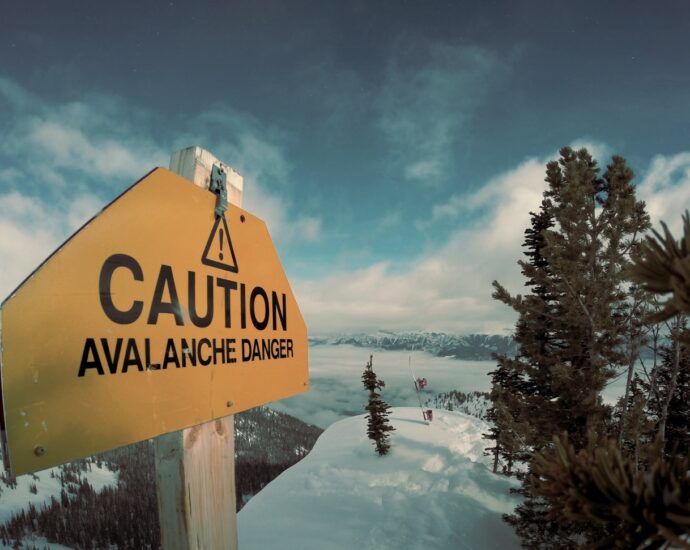 caution avalanche danger signage during winter