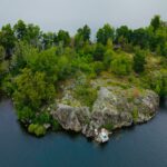 a small island in the middle of a body of water