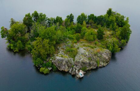 a small island in the middle of a body of water