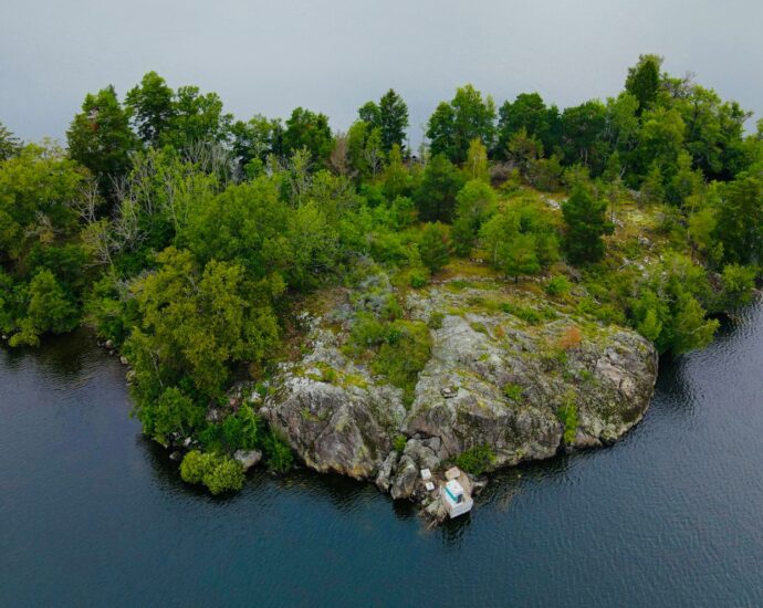 a small island in the middle of a body of water