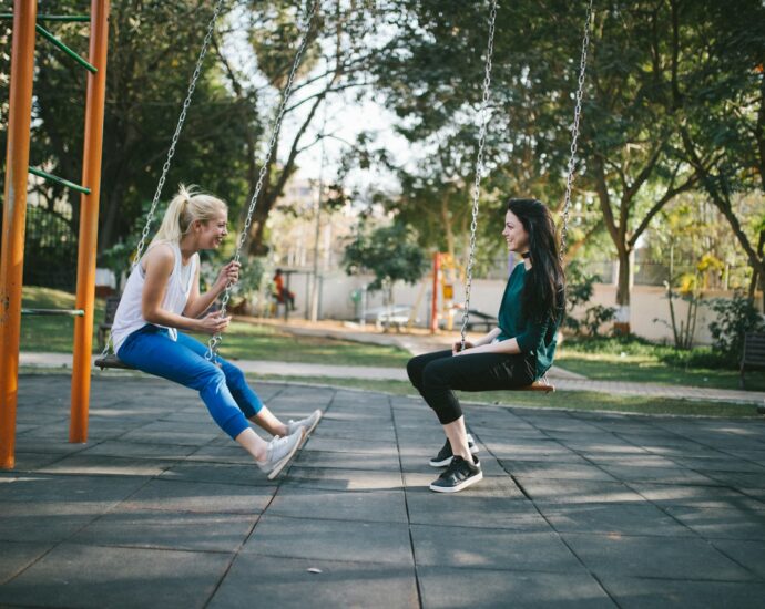 woman sitting on swing