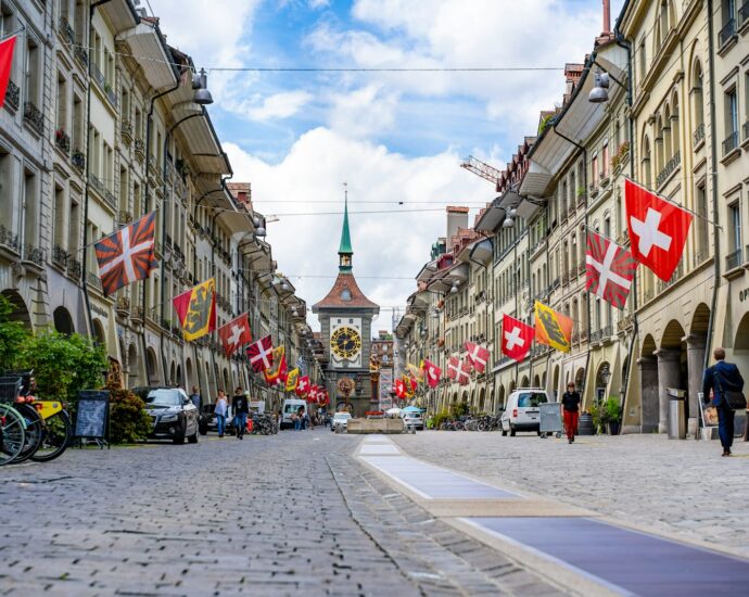 people walking on street near buildings during daytime