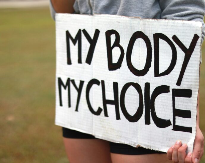 a person holding a sign