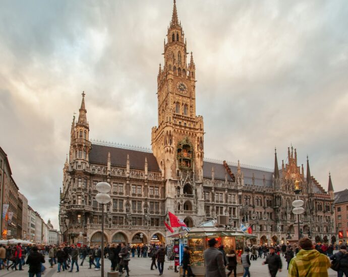 people near brown building during daytime