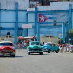 cars parked on street near building during daytime