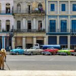 five assorted-colored cars photo