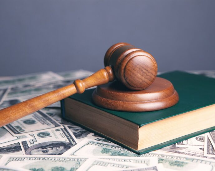 brown wooden chess piece on brown book