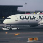 A large jetliner sitting on top of an airport tarmac