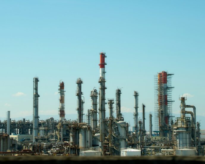 A factory with a lot of pipes and buildings