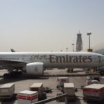 a large jetliner sitting on top of an airport tarmac
