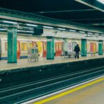 a person standing in a train station