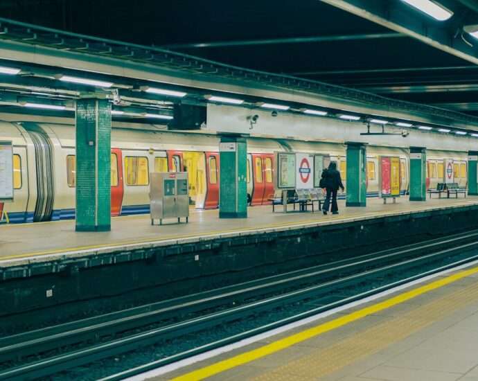 a person standing in a train station
