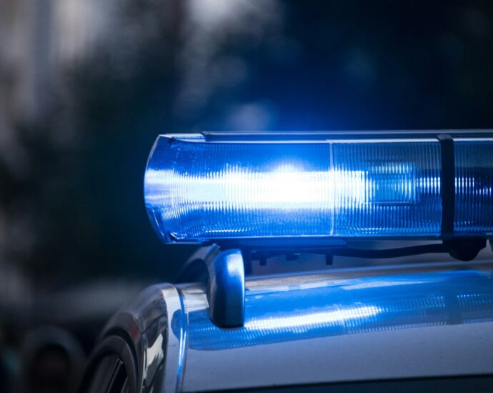 a close up of a police car with its lights on