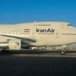 a large air plane sitting on top of an airport tarmac