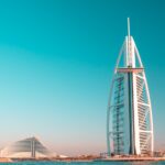 white metal bridge under blue sky during daytime