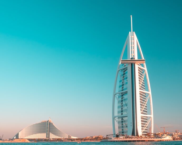 white metal bridge under blue sky during daytime