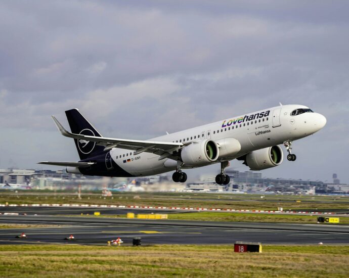 a large jetliner taking off from an airport runway