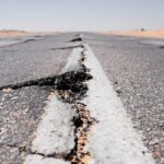 a crack in the middle of a road in the middle of nowhere