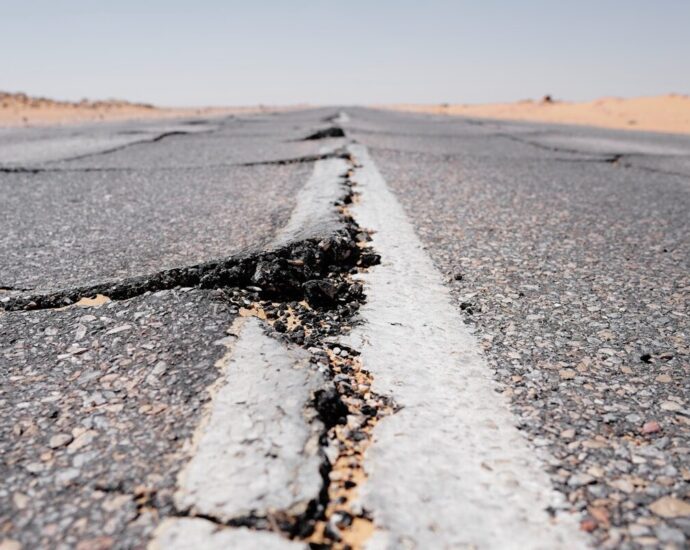 a crack in the middle of a road in the middle of nowhere