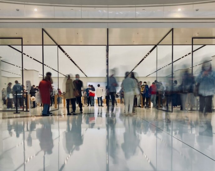 people walking on white floor tiles