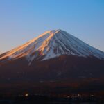 Mount Fuji with snow-covered peak under a clear blue sky in Fujinomiya, Japan