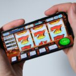 Someone is playing a mobile slot machine game