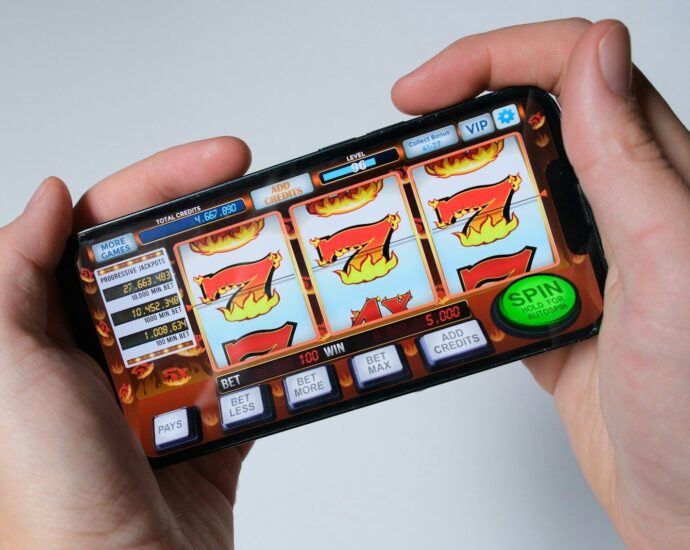 Someone is playing a mobile slot machine game